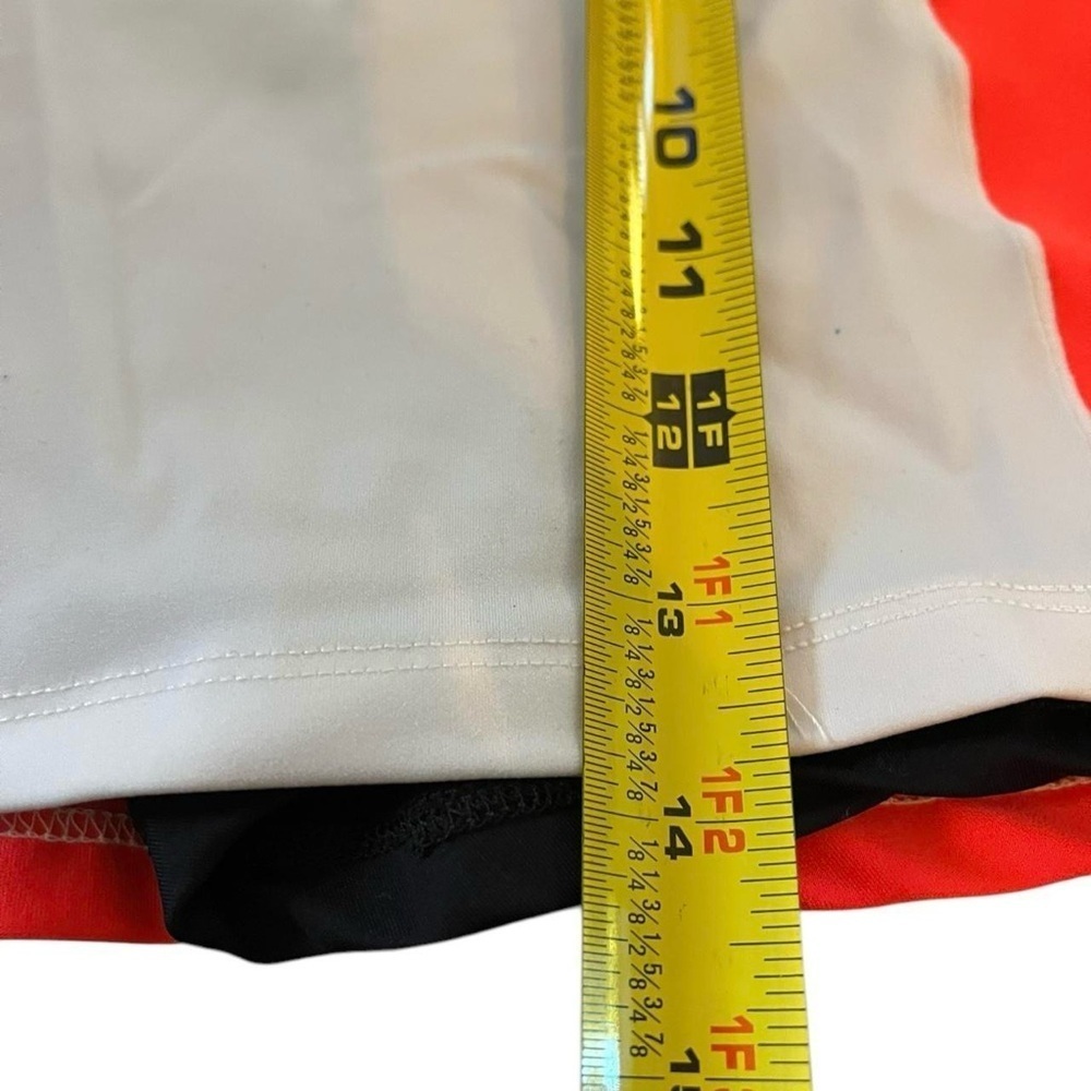 Orange and white tennis skirt with shorts underneath #tennisskirt #skort
-866 - Picture 8 of 8